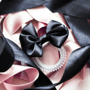 INVISIBOBBLE Bowtique True Black spiral hair ring meets bow